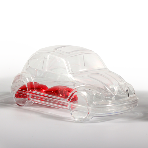 Stylized car-shaped box from transparent plastic with eyehole for hanging 
or ribbon. Box is made from two lockable parts. Suitable for small souvenir or candy packaging or as a decoration.