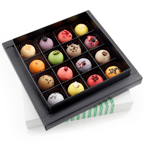 For those searching for a subtle memorable Christmas gift - pastel color 
handmade truffles in the box with the logo. Here, the sweetness of the chocolate and the flavors of the fruit variety are harmonious. Creamy candy filling is simply melting in the mouth.