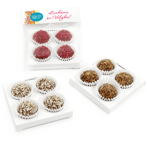 Collection of truffles of different flavors and colors. A fine box 
with four truffles. Press on cover with individual design.