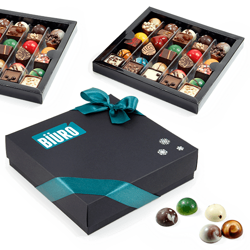 Two-section box with collection christmas candies. Bitter chocolate and 
pepper notes, sweet chocolate spread 