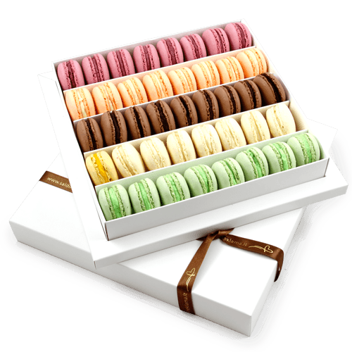Edible gift - excellent Christmas greeting. Almond delicacies Macarons 
in the gorgeous white box - an impressive business gift for an important partner. Box from the white cardboard. Design: logo and drawings on the box cover or ribbon.
