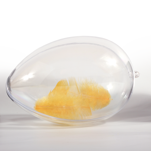 Stylized egg-shaped box from transparent plastic with eyehole for hanging 
or ribbon. Box is made from two lockable parts. Suitable for small souvenir or candy packaging or as a decoration.
